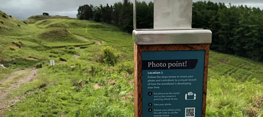 Photo post location one at Drumbrae, metal bracket to place phone, view in the background