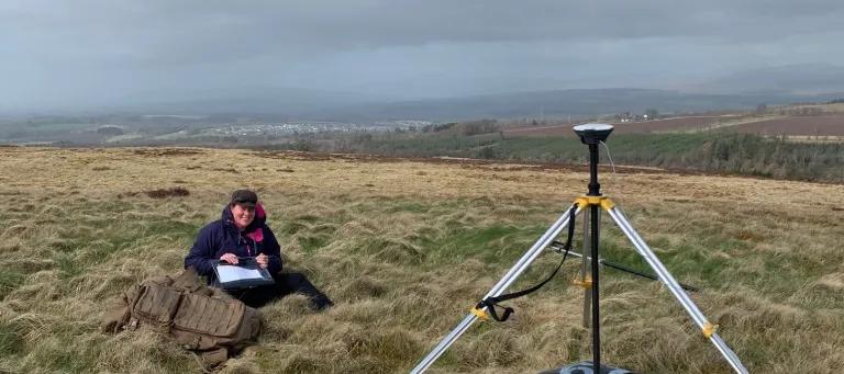 Liz Poulsom working on ground control point survey at Drumbrae