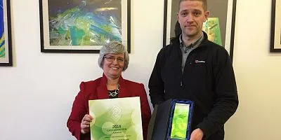 Tim Calder and Professor Eleanor Campbell#0009receive the awards
