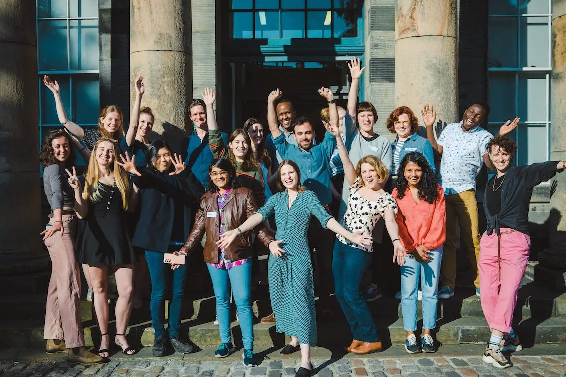 A group of people looking happy - the Edinburgh Earth Fellows