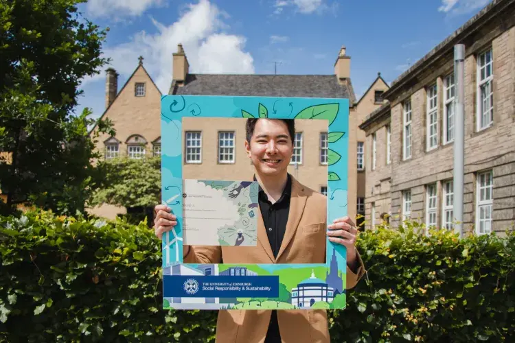 Changemaker hold certificates and poses in SRS selfie frame