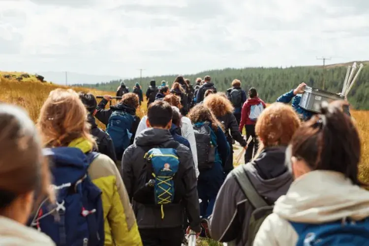 Students from the Ecological measurements field course, School of Geosciences, heading to the field site location at Barvick Burn, Forest and Peatland Programme site   