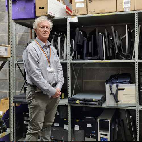 Changemaker Award 2023 - Mitchell Hunter beside equipment for recycling