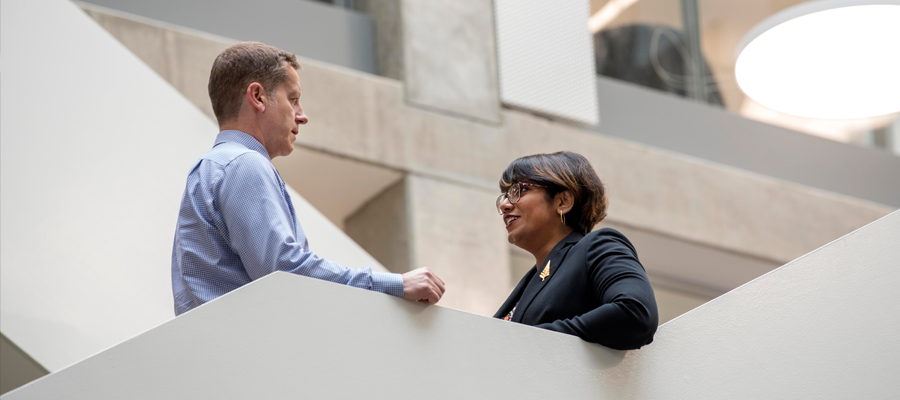 University staff talking - Douglas Robertson